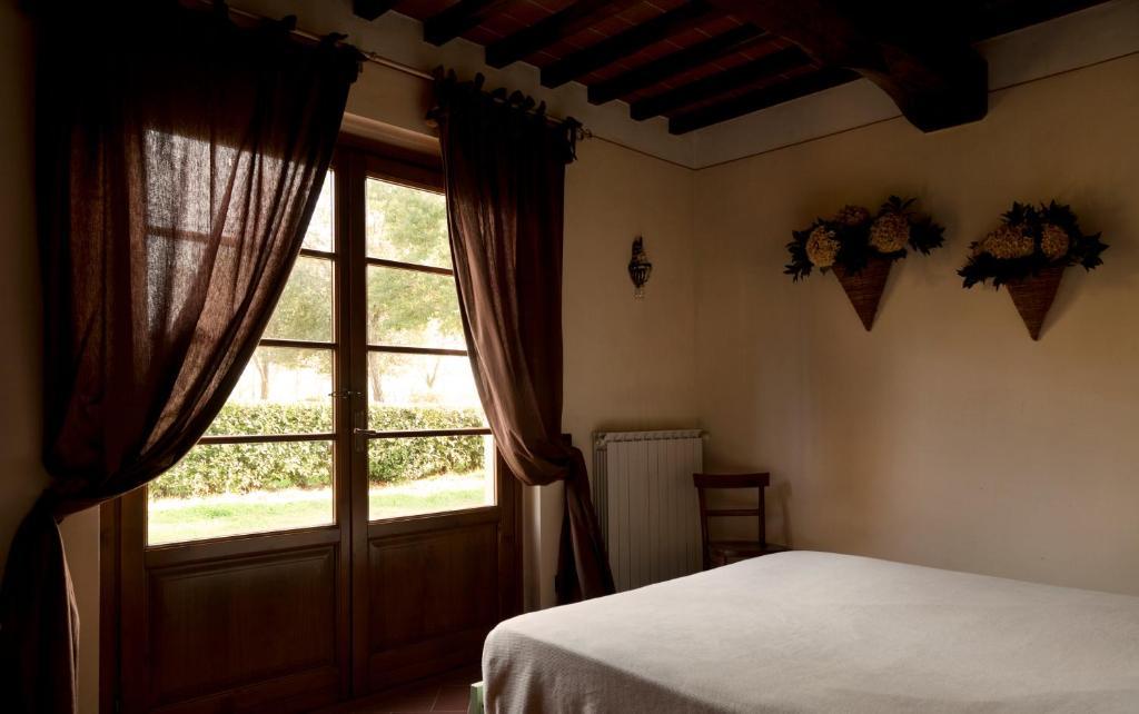 Agriturismo Fattoria Rozzalupi Черрето-Гвиди Номер фото